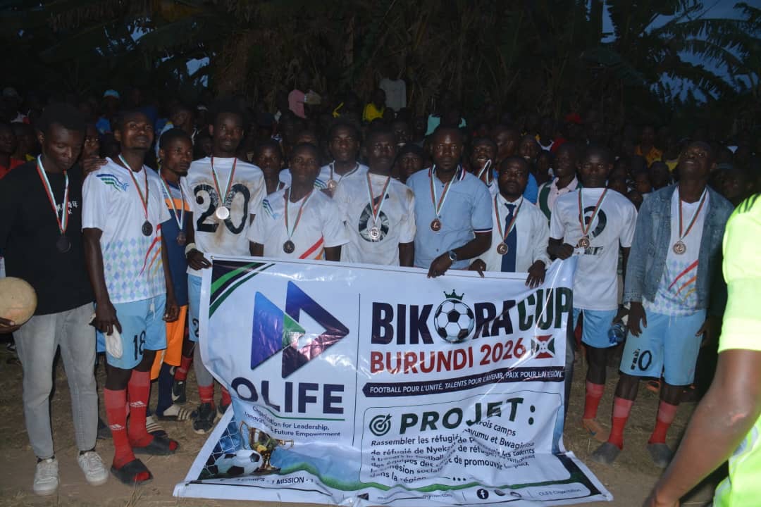 Tournament participants displaying medals